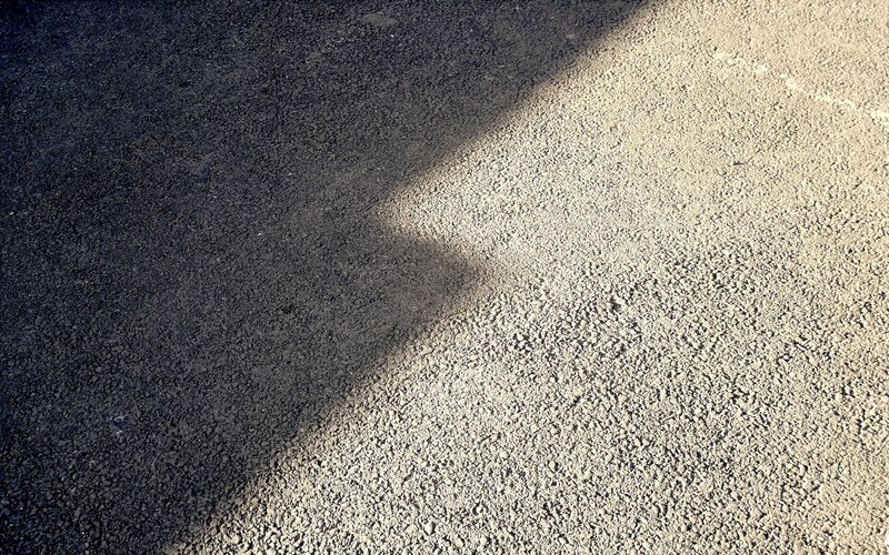 asphalt surface with shadow