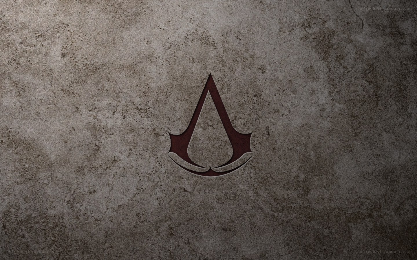 Assassin's Creed logo on stone