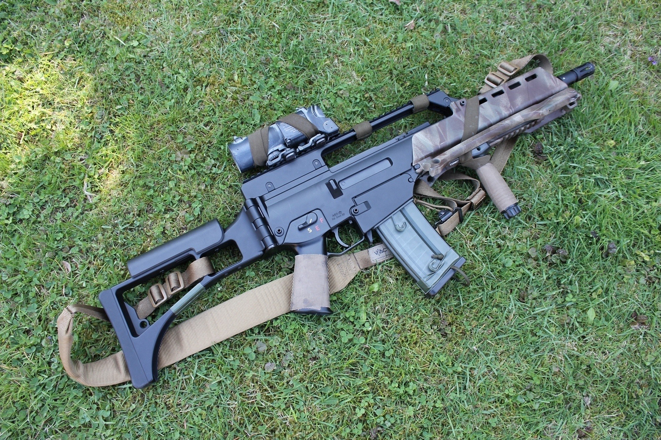 assault rifle on grass