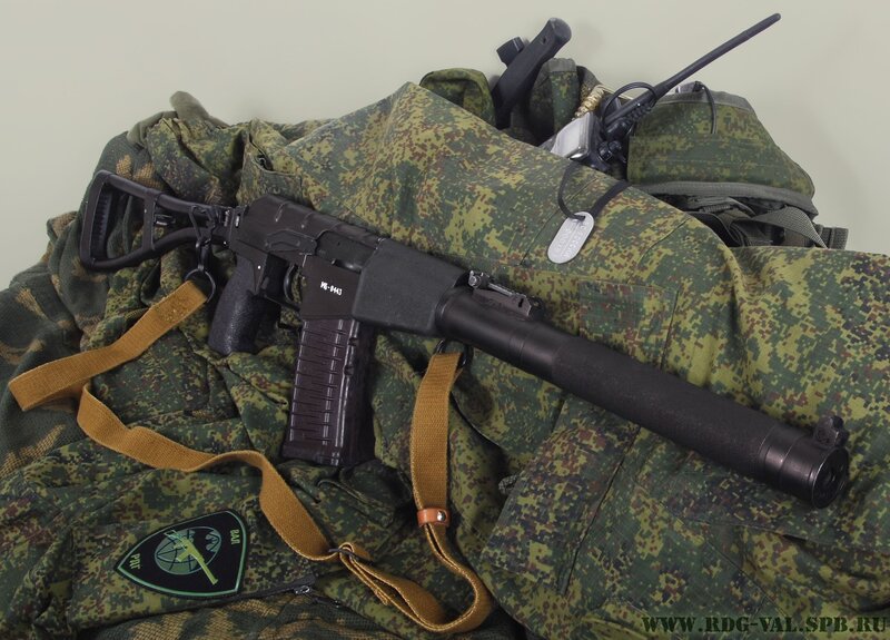 Assault rifle on military gear