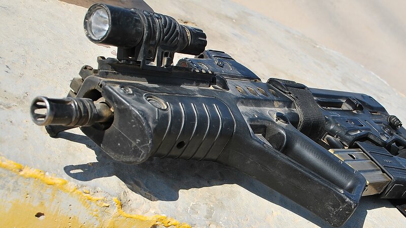 Assault rifle with flashlight
