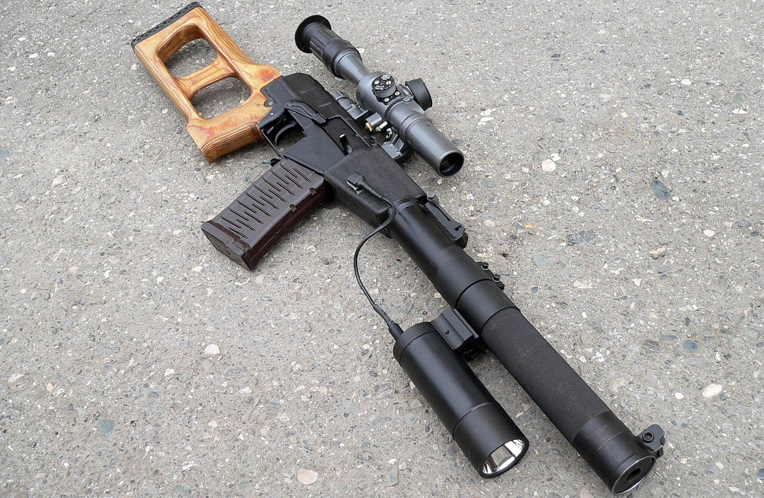 Assault rifle with scope and flashlight