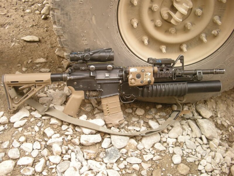 Assault rifle with scope and grenade launcher