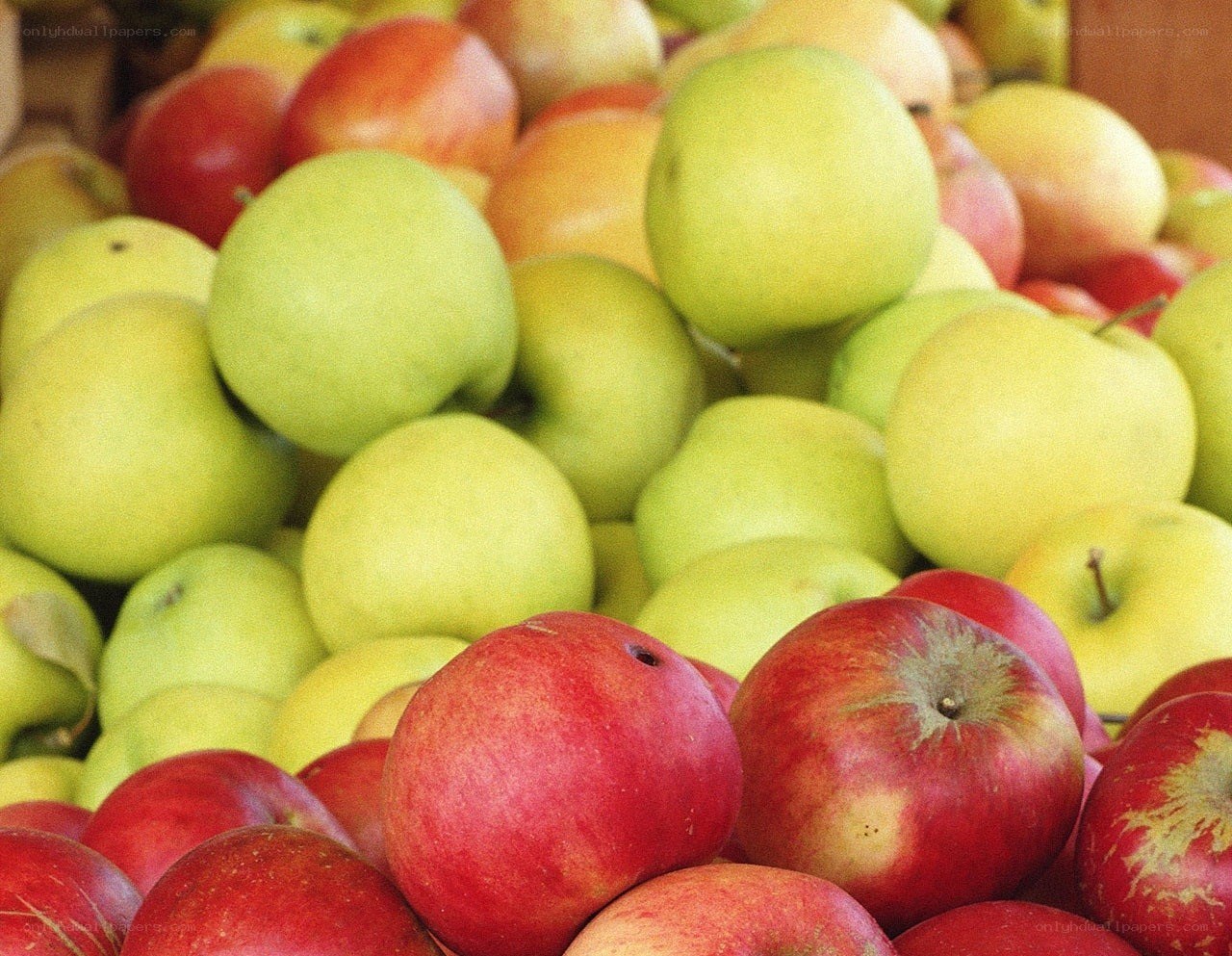 Assorted apples at market