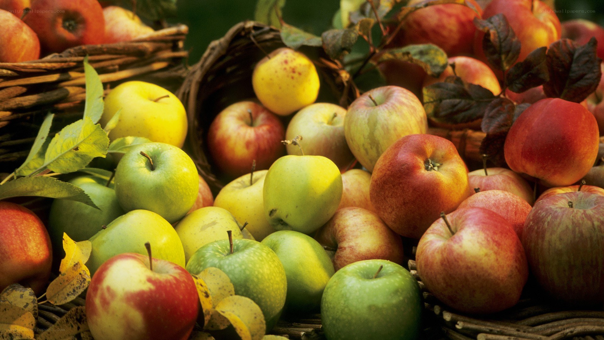 Assorted apples in baskets