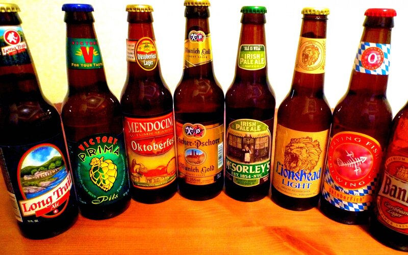 Assorted beer bottles on a table