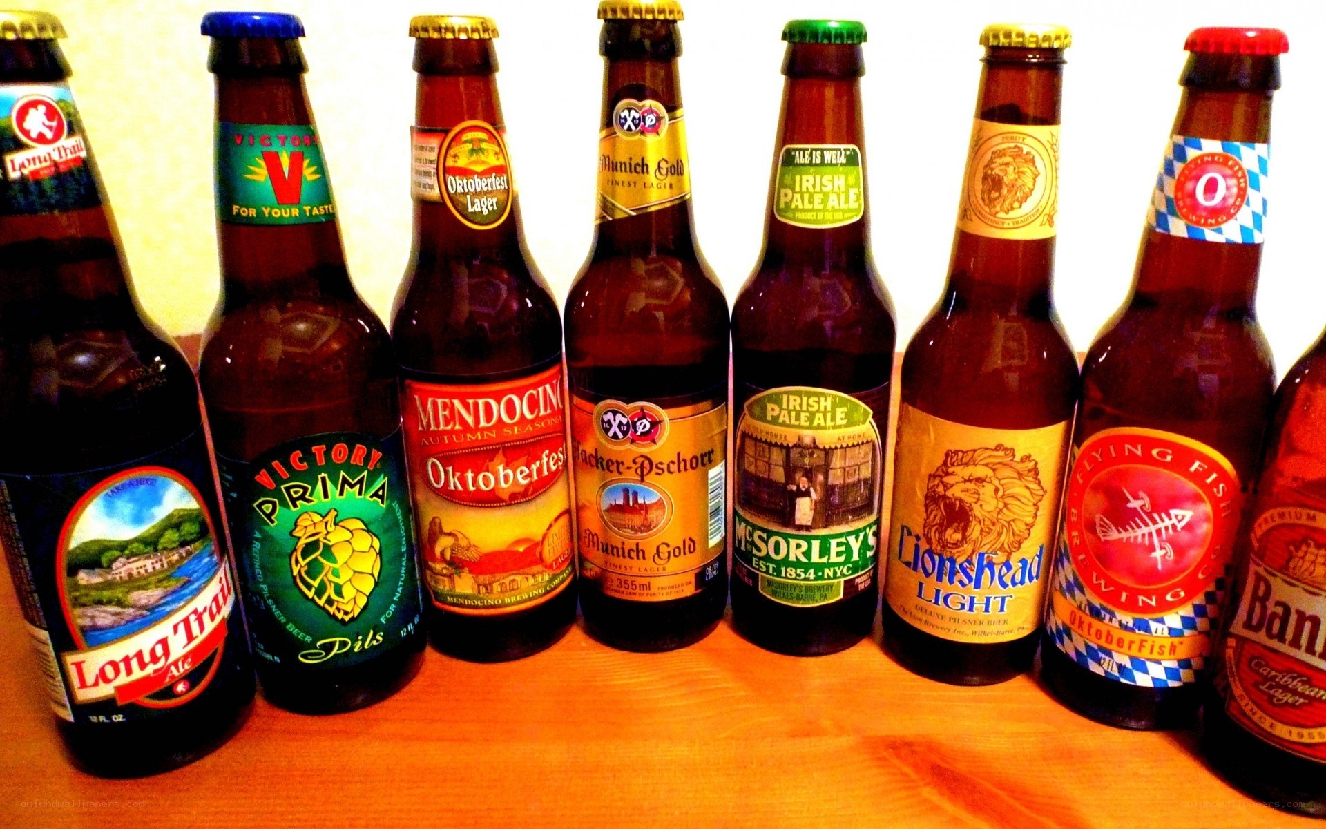 Assorted beer bottles on a table