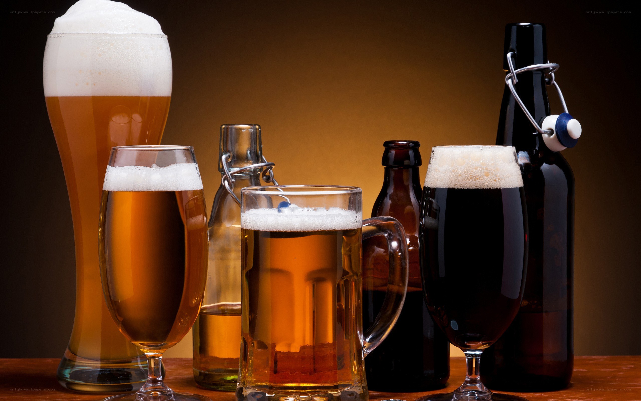 Assorted beers in glasses and bottles