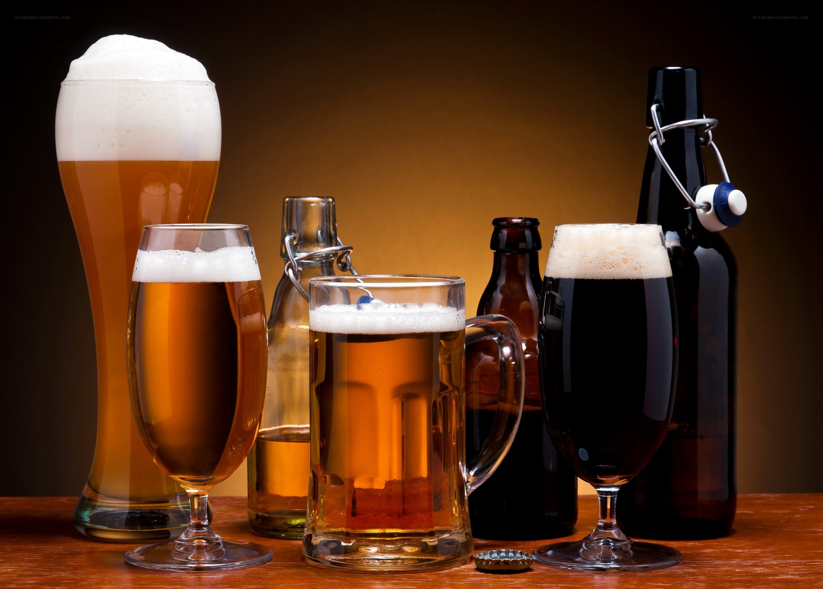 Assorted beers in glasses and bottles