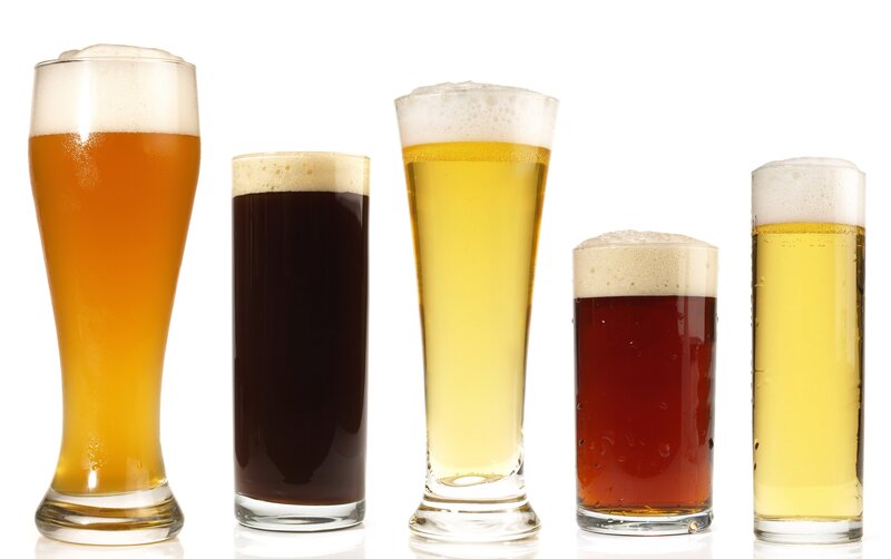 assorted beers in glasses