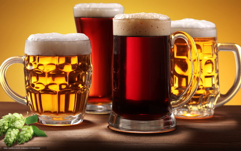 Assorted beers in mugs
