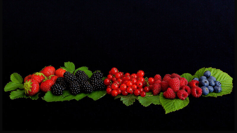 Assorted Berries on Leaves