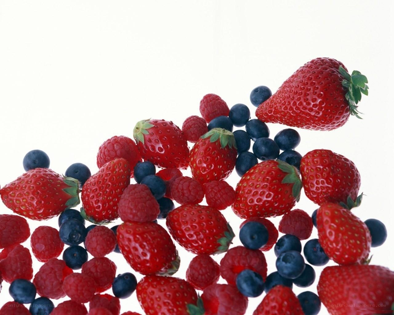 assorted berries on white