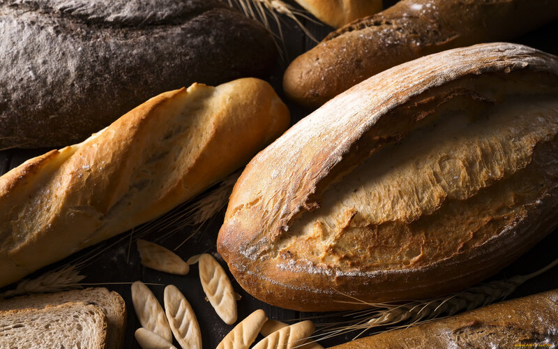 Assorted Bread Loaves — Brown, Dramatic