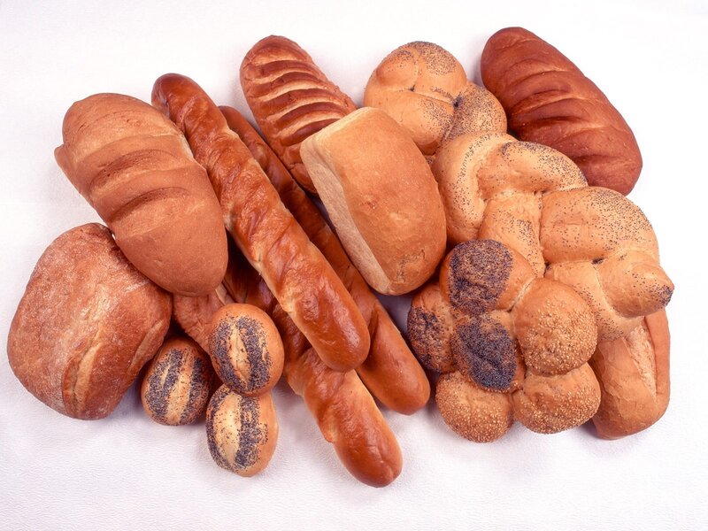 Assorted breads on white
