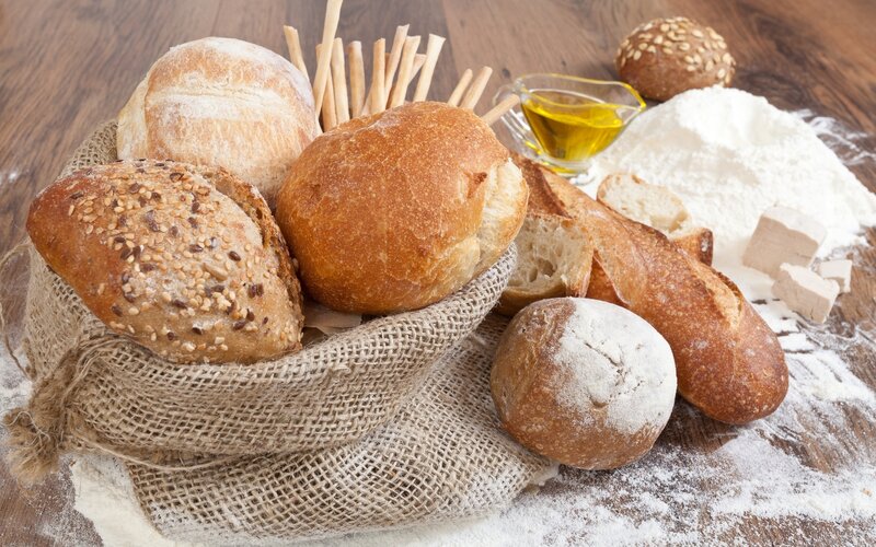 Assorted Breads on Wood