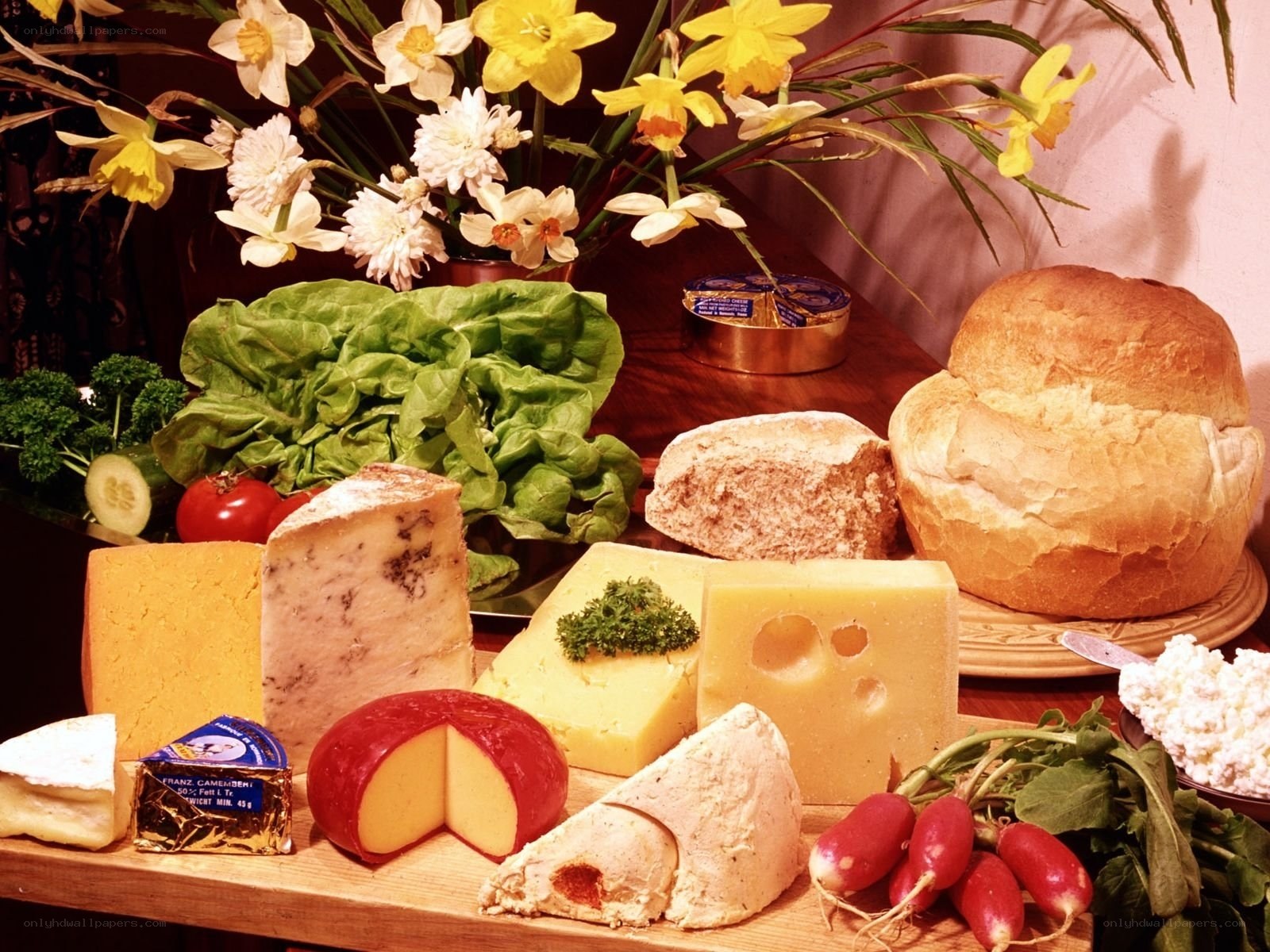 Assorted cheeses and fresh produce