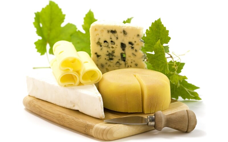 Assorted Cheeses on Board — White, Neutral