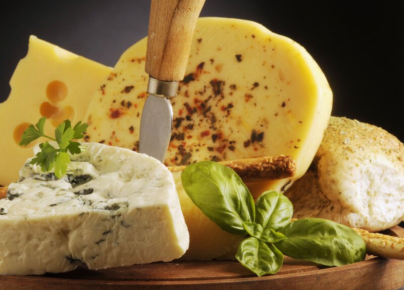 Assorted Cheeses on Board — Yellow, Dramatic