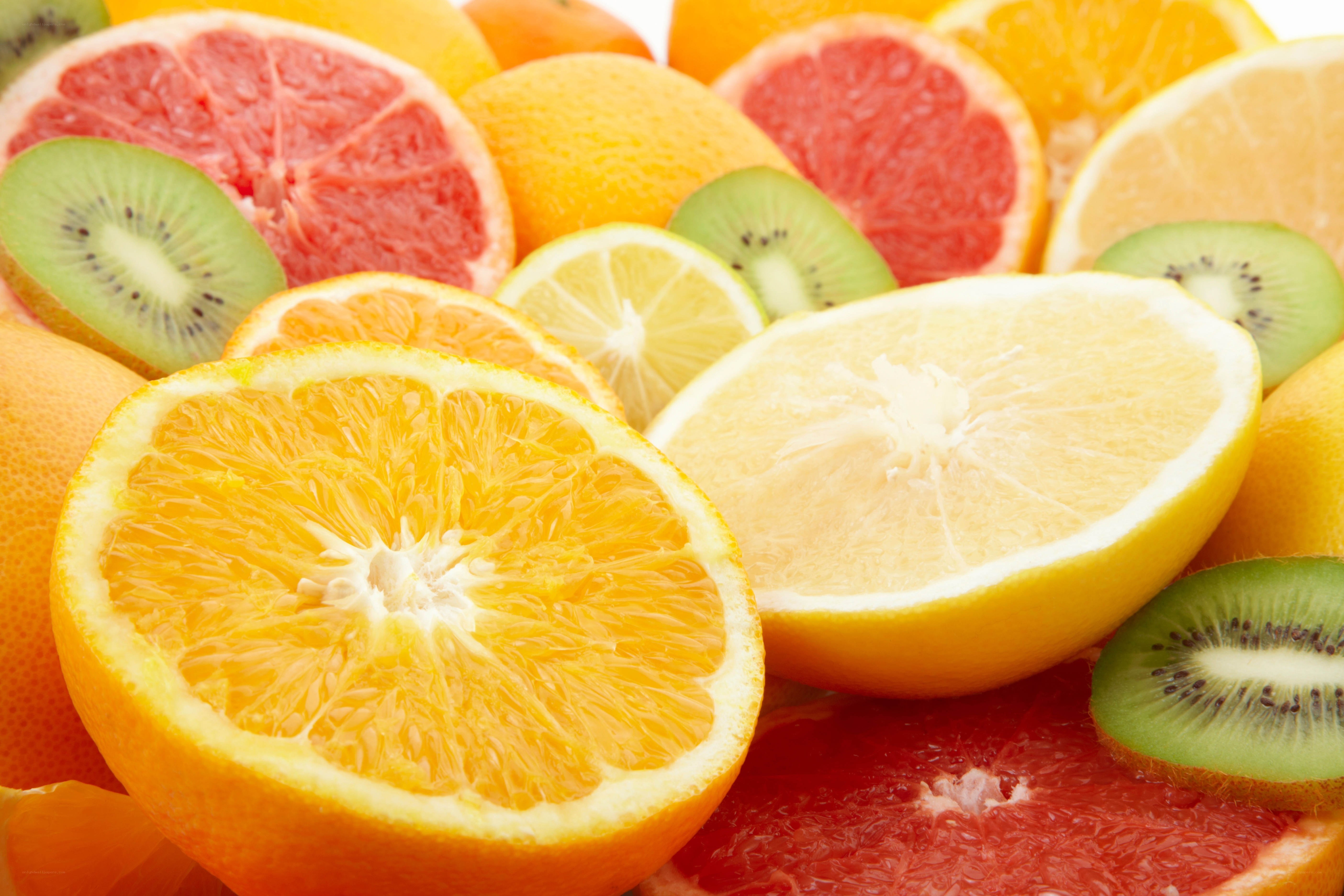 assorted citrus fruits and kiwi