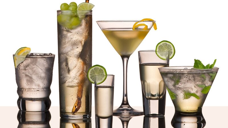 Assorted cocktails with garnishes