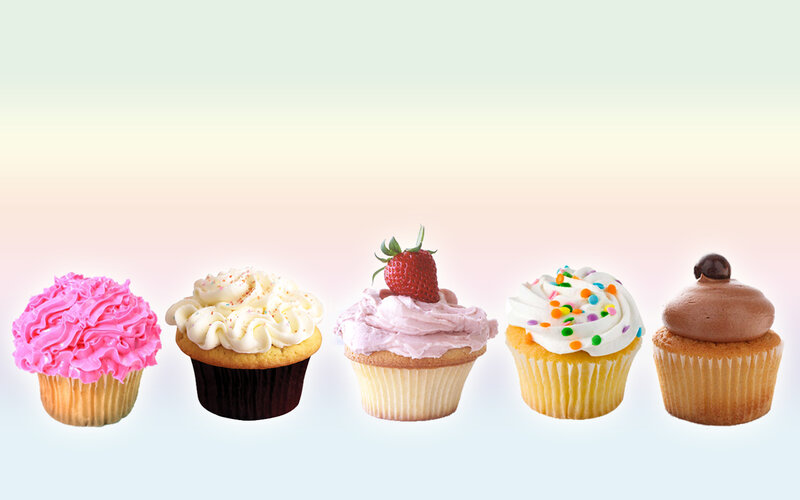 assorted cupcakes in a row