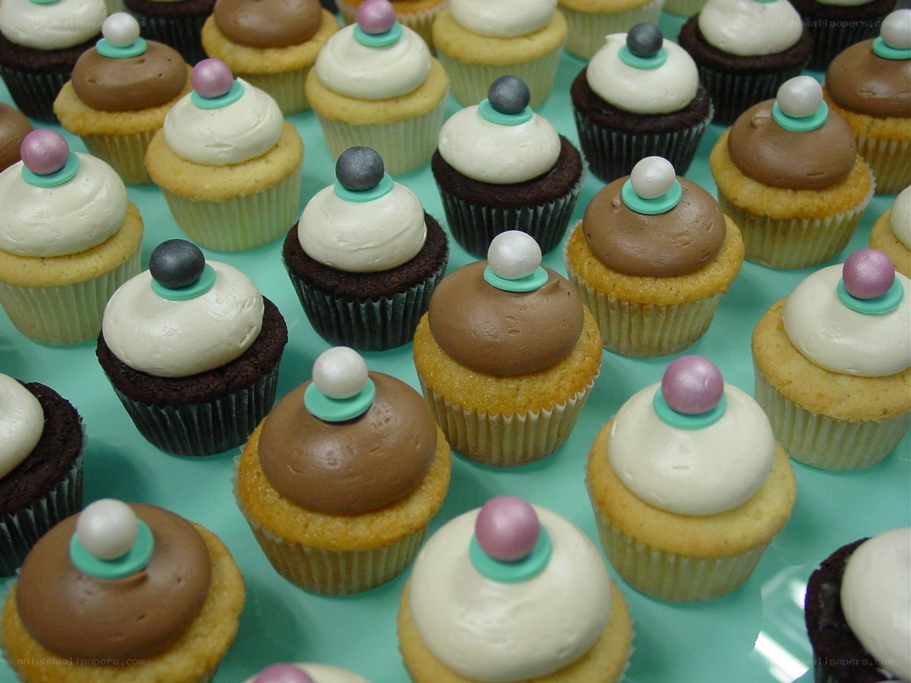 Assorted cupcakes on display