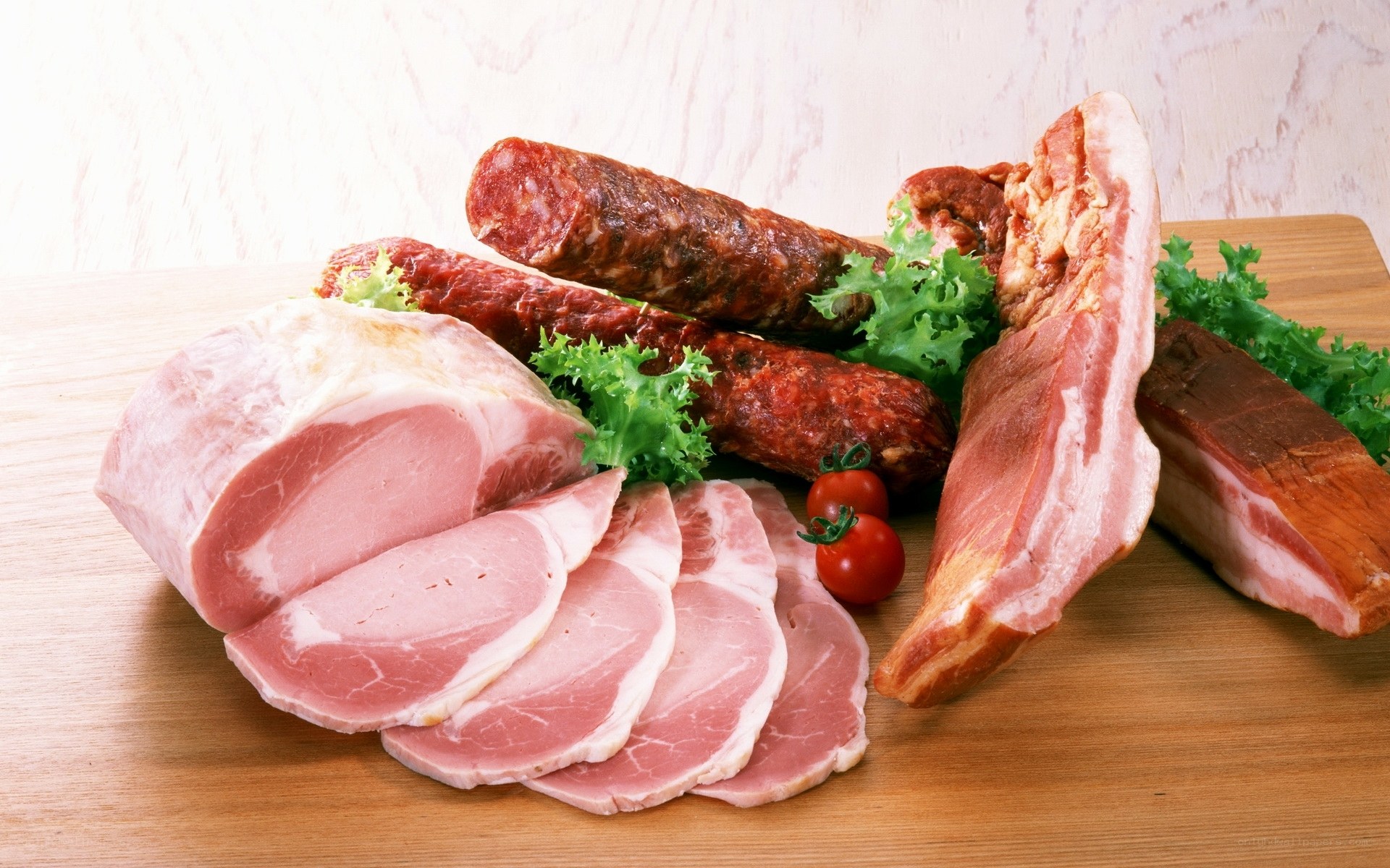 assorted cured meats on a board