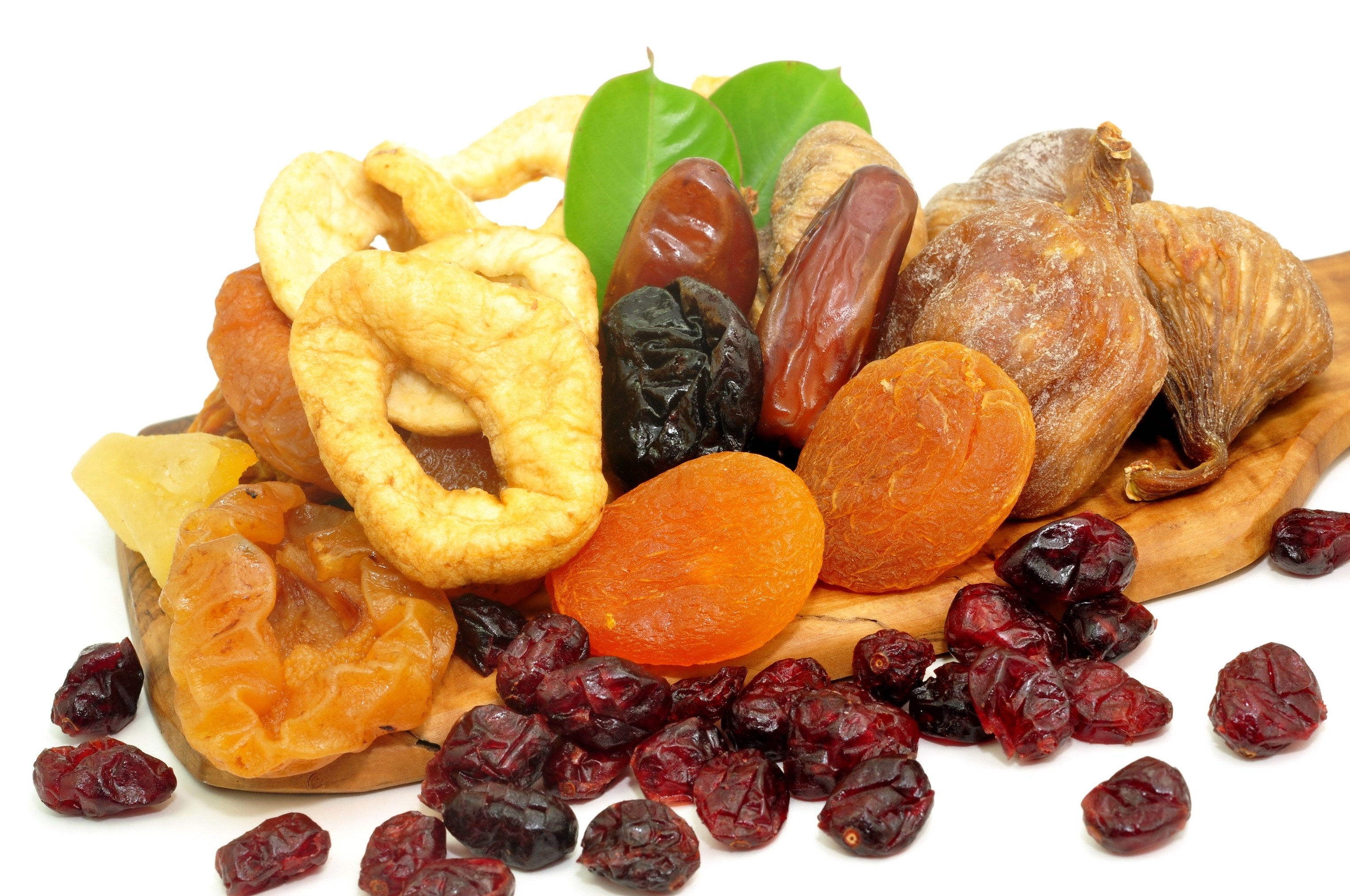 Assorted dried fruits on a board