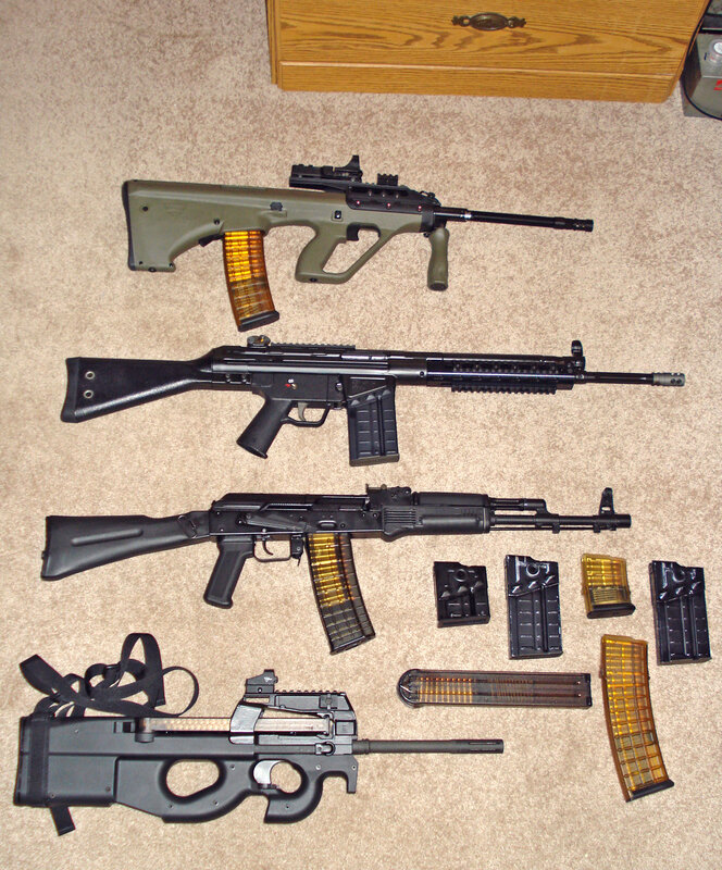 Assorted firearms on carpet