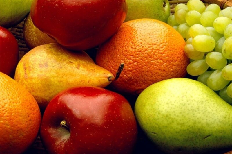 Assorted fresh fruits in a basket
