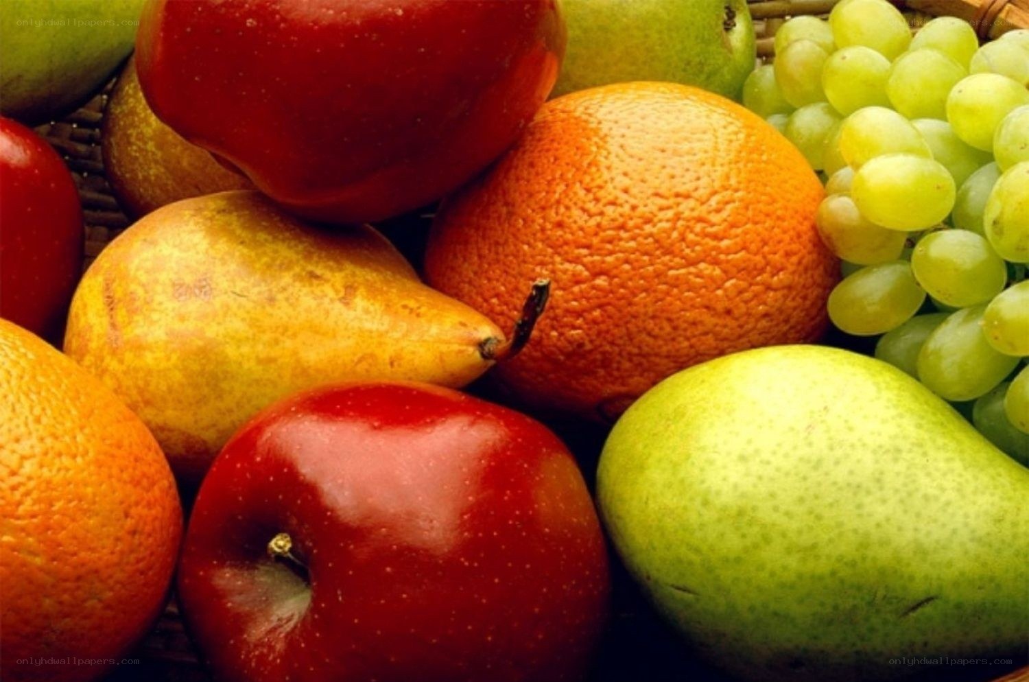 Assorted fresh fruits in a basket