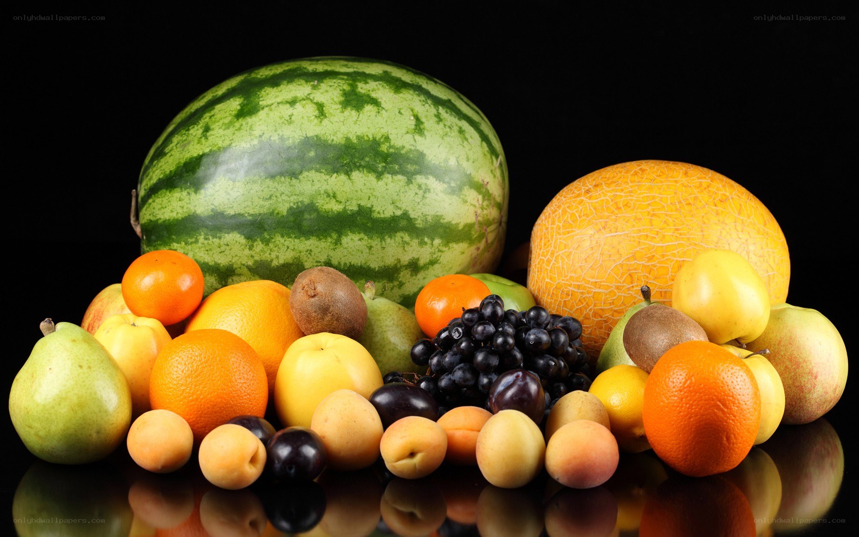 assorted fresh fruits on black