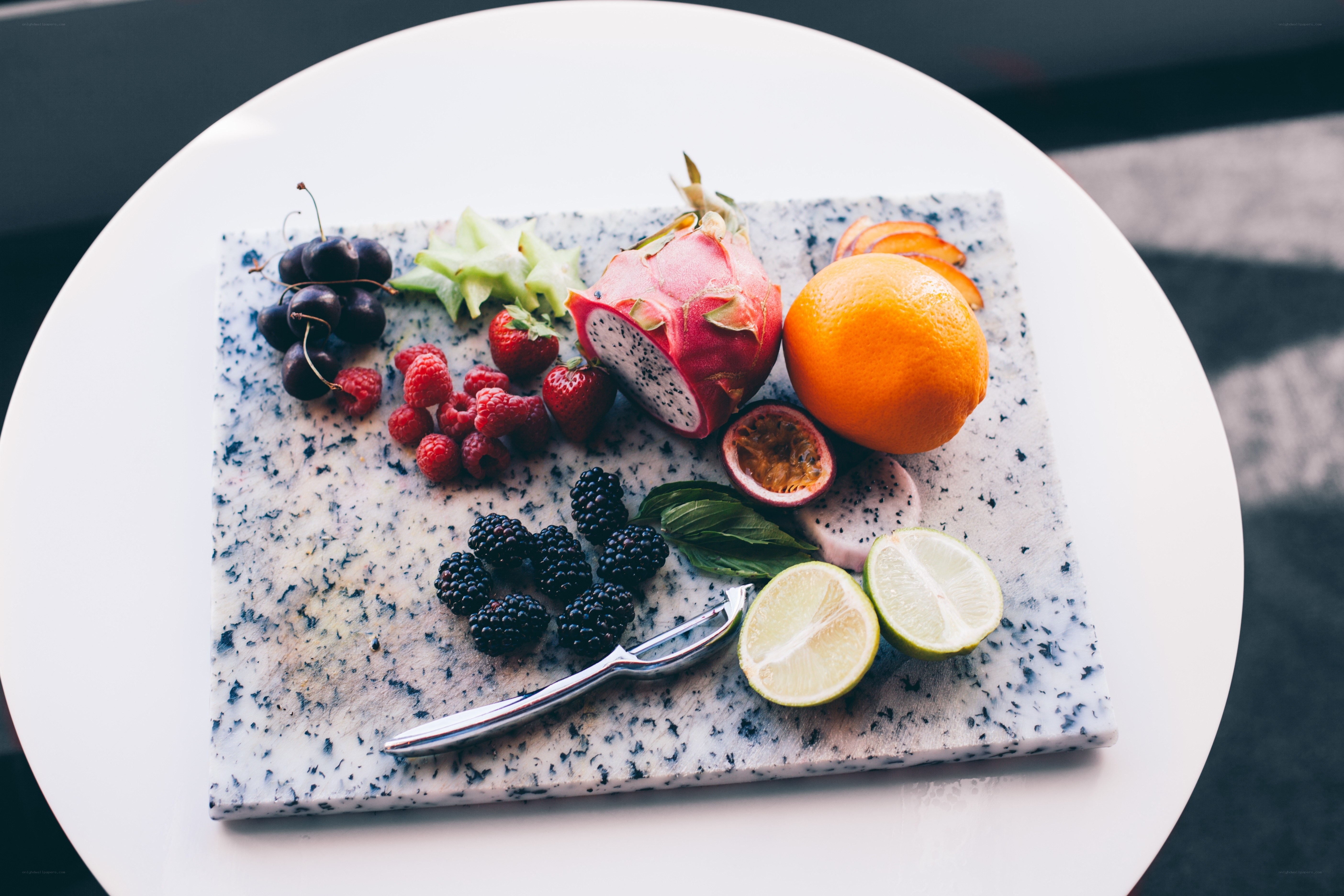 assorted fresh fruits on marble