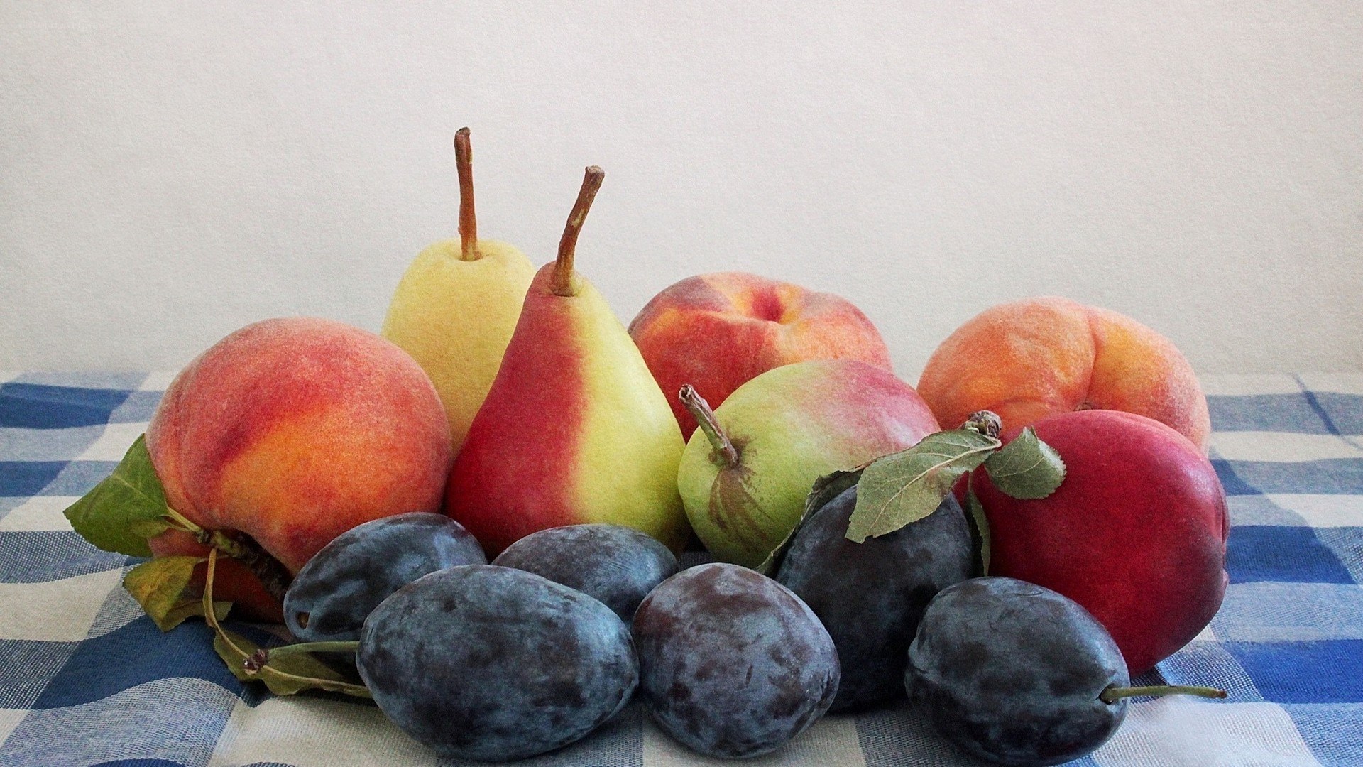 Assorted fresh fruits on table