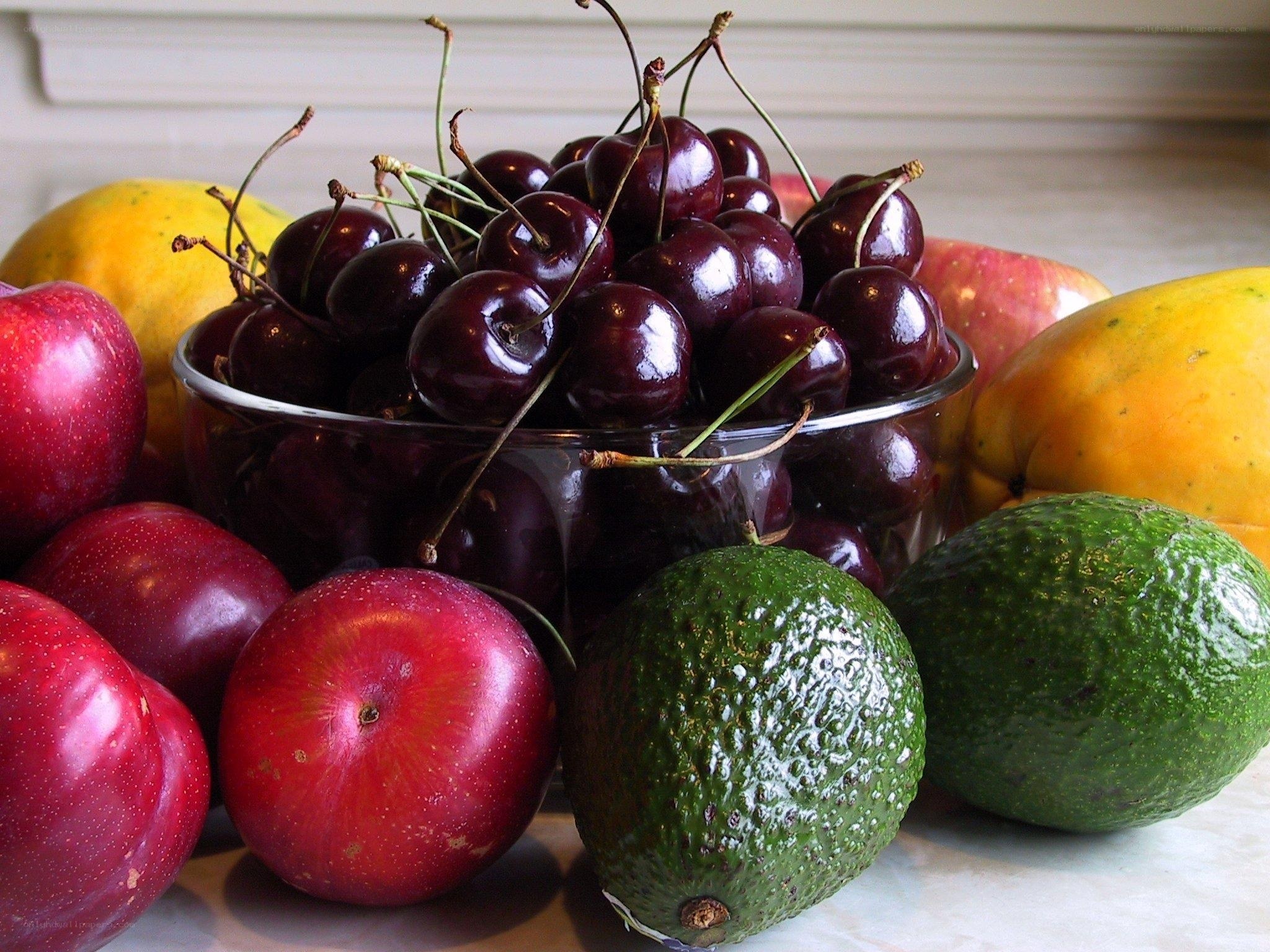 Assorted fresh fruits on table