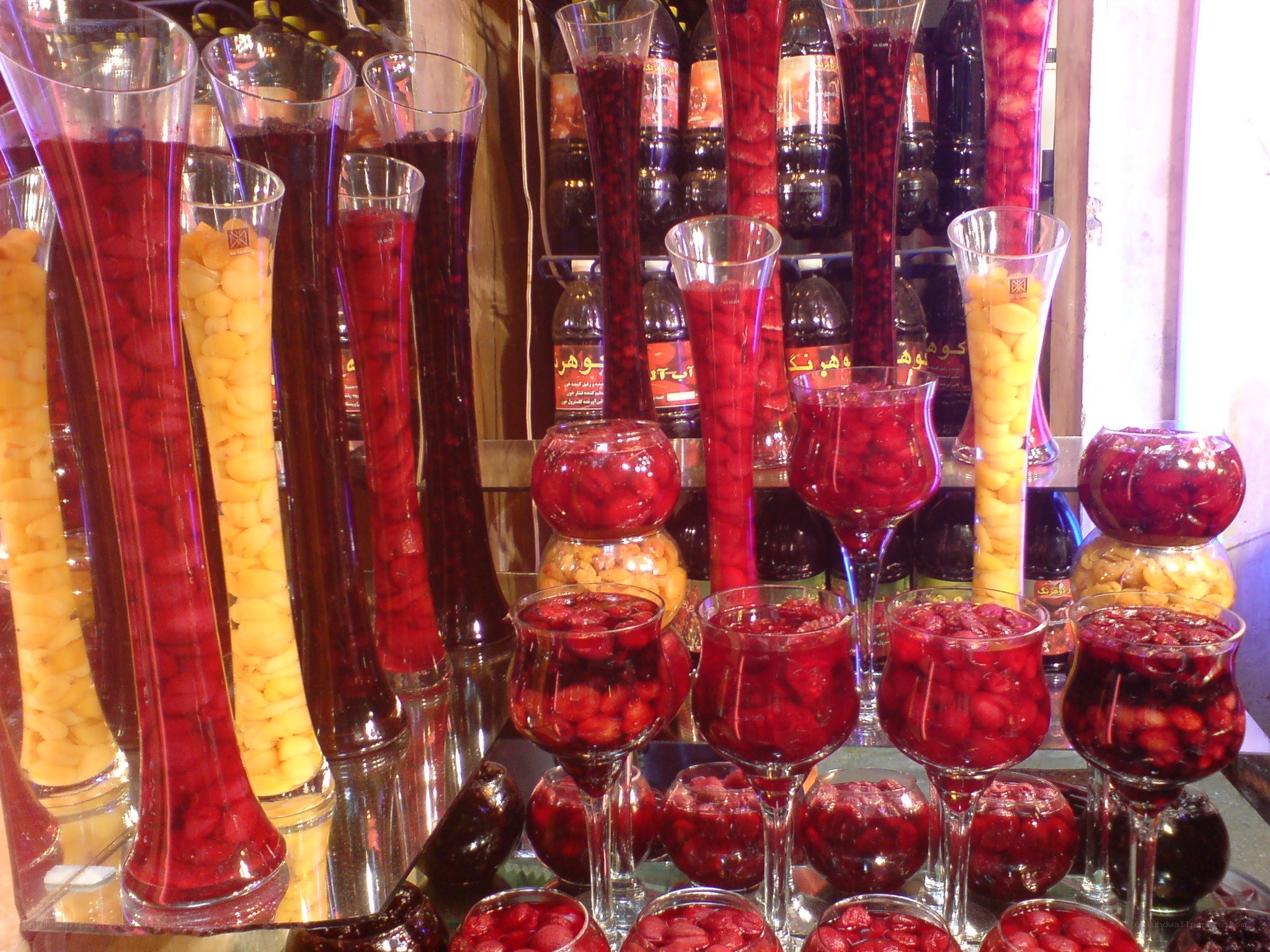 Assorted fruit preserves in glass jars
