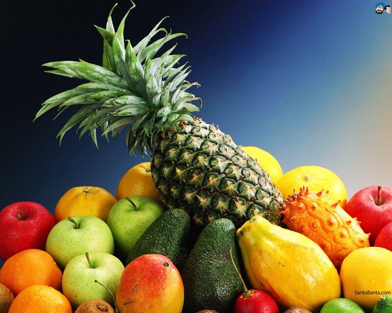 assorted fruits on blue background