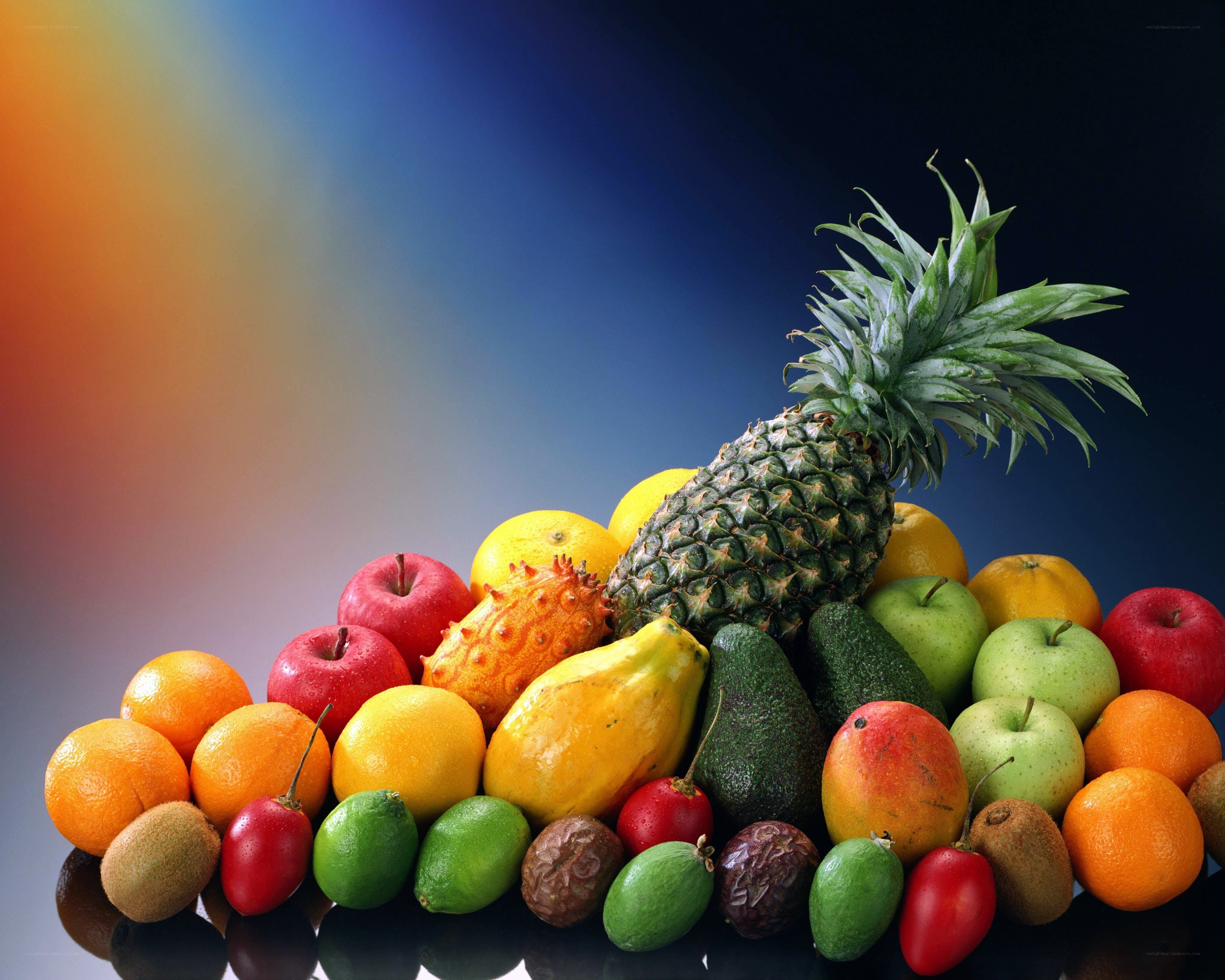 Assorted fruits on colorful background