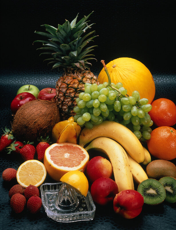 Assorted Fruits on Dark Surface