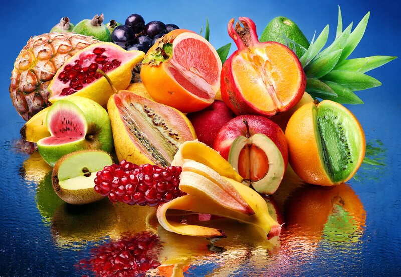 Assorted Fruits on Surface — Blue