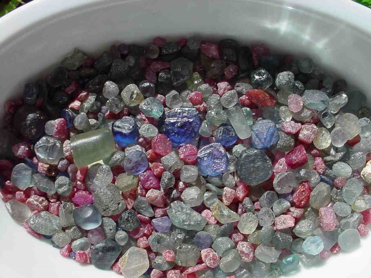 assorted gemstones in a bowl
