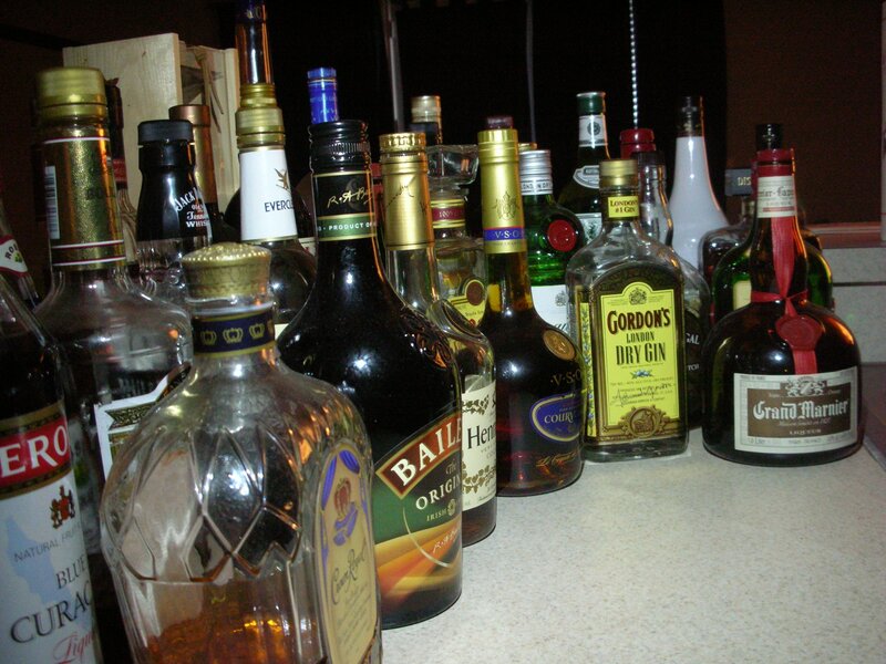 assorted liquor bottles on counter