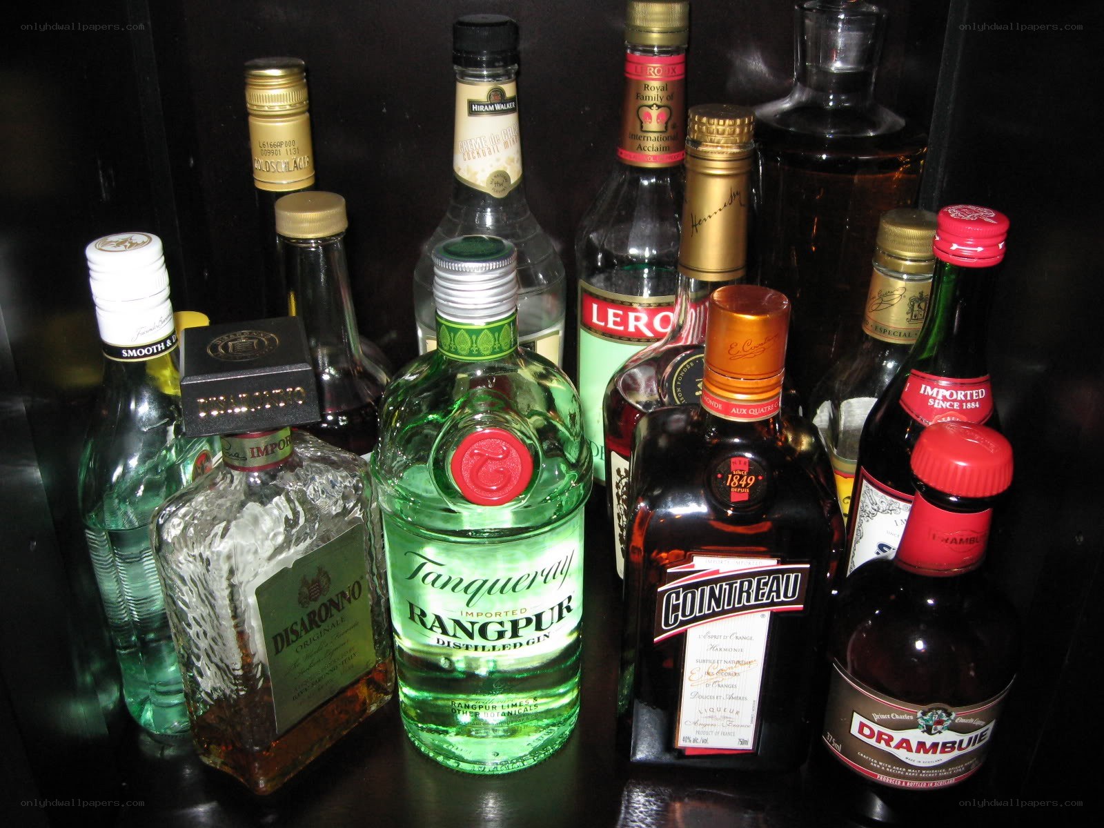 Assorted liquor bottles on shelf