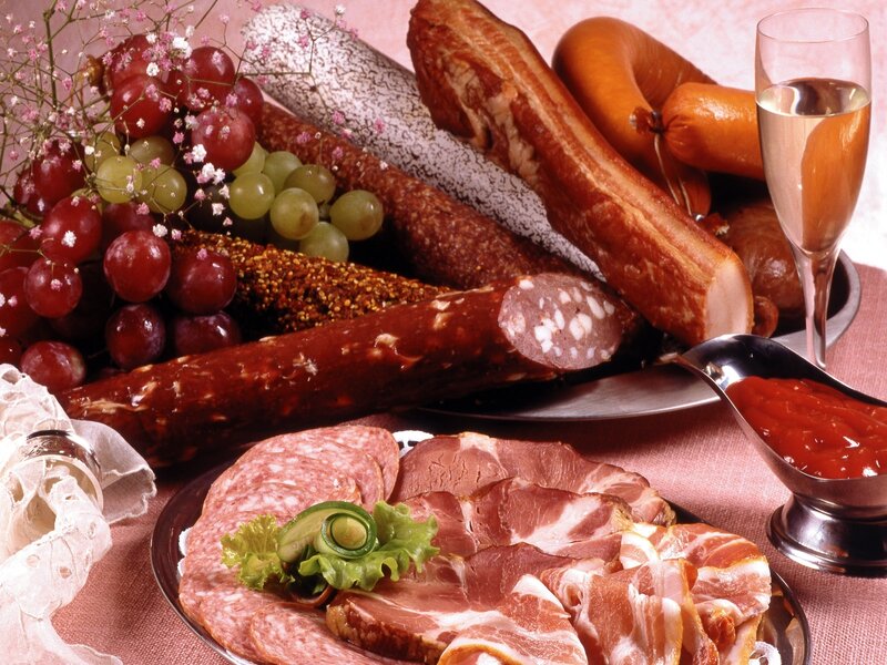 Assorted meats and grapes