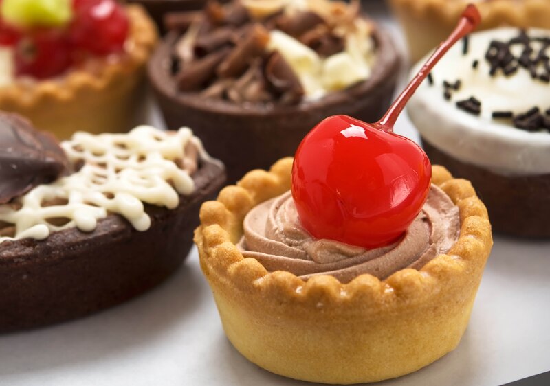 Assorted mini desserts with cherry