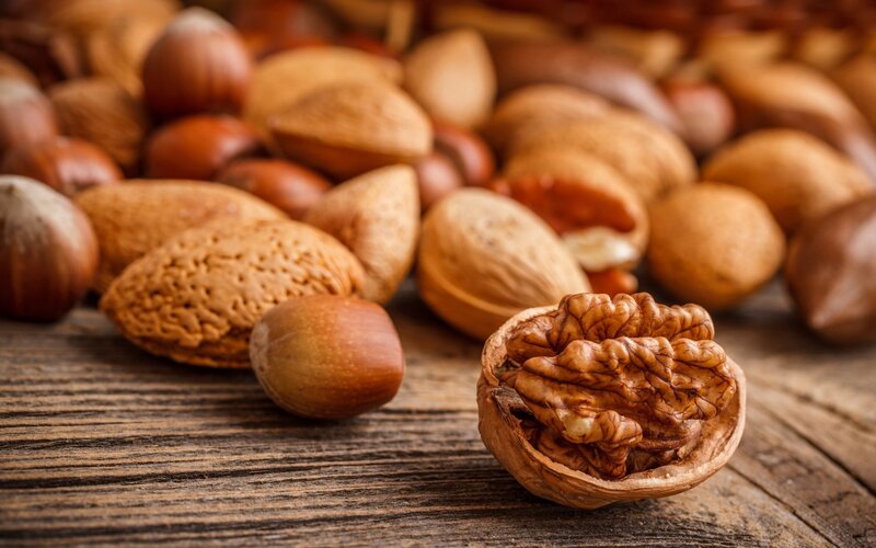 Assorted Nuts on Wood — Brown, Natural, Photograph