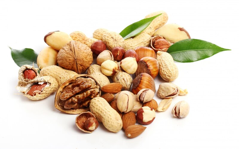 assorted nuts with leaves