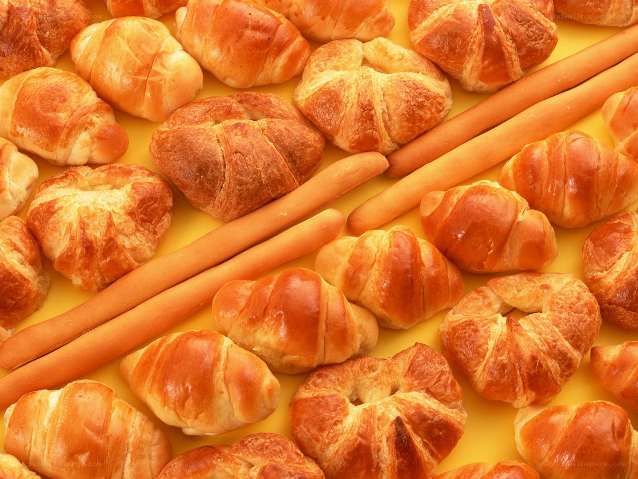Assorted pastries on yellow