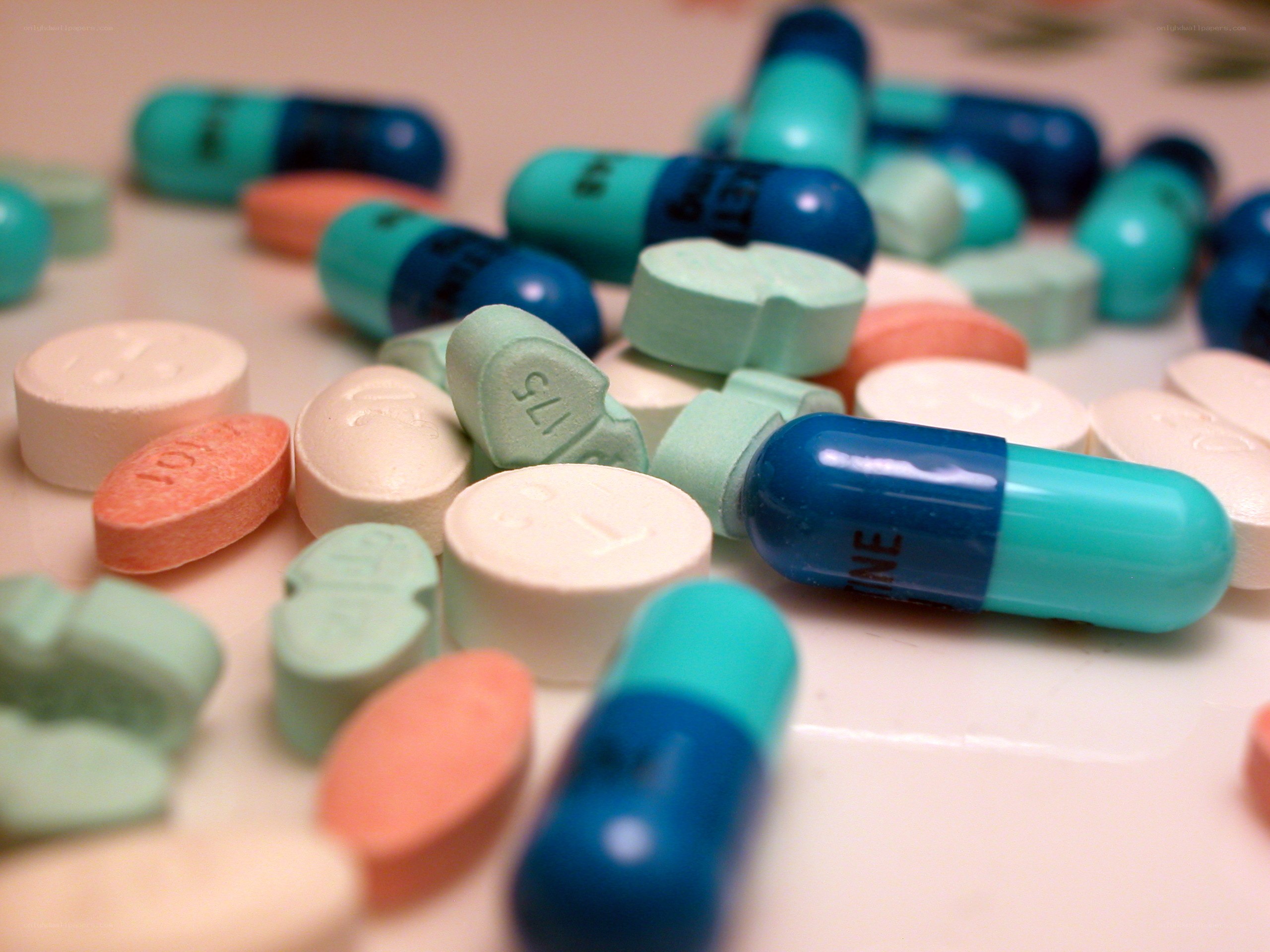 assorted pills and capsules